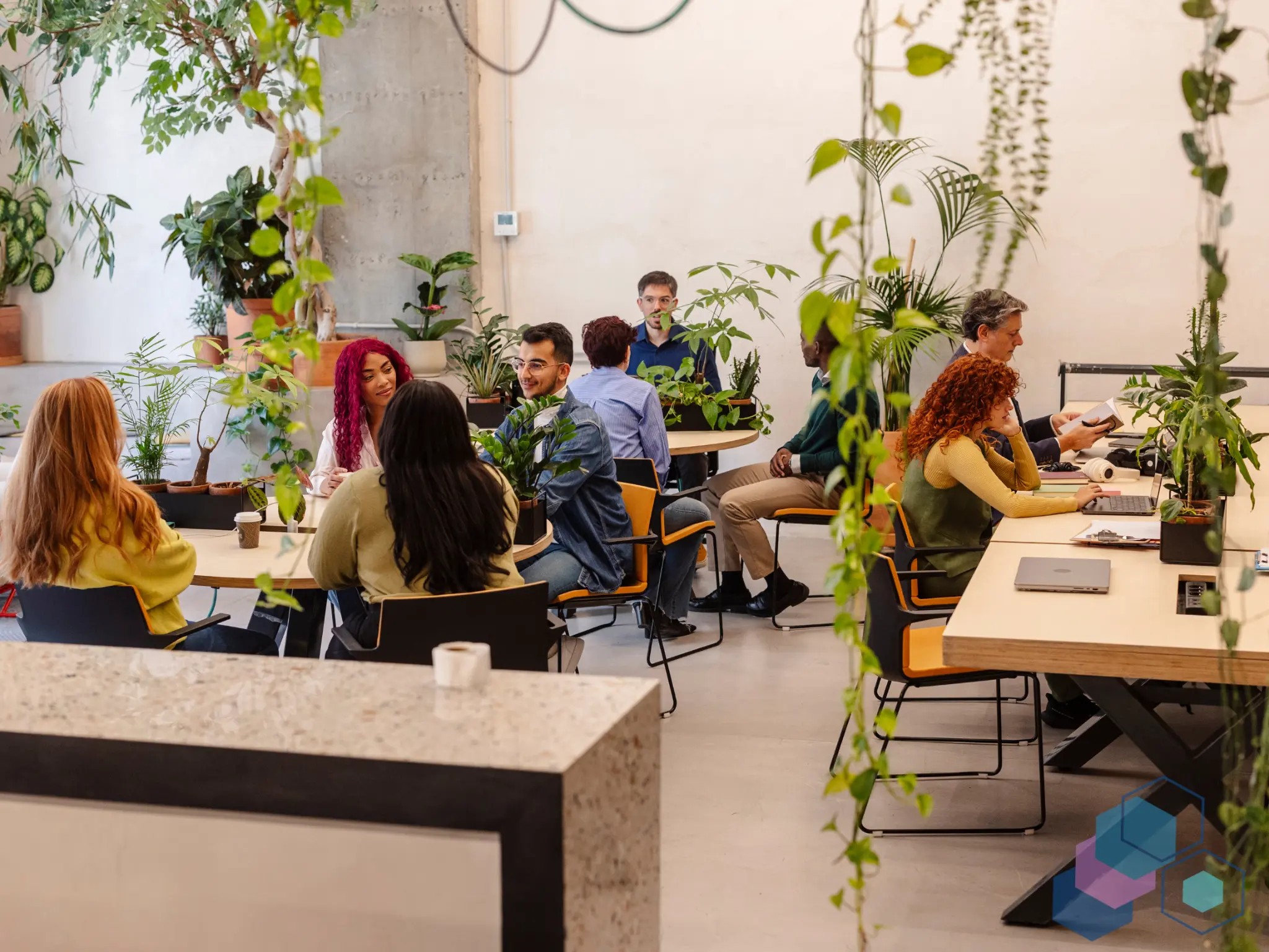 Diverse inclusive team working together in a modern open office environment